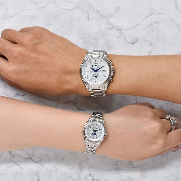 Đồng hồ cặp đôi Citizen Eco-Drive Exceed AT9130-69W / EE1010-62W